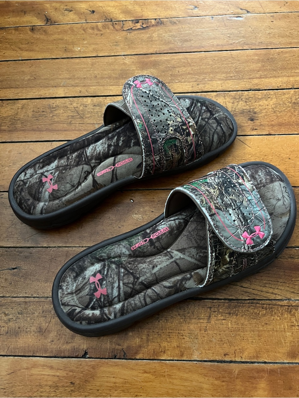 Under Armour Women's Real Tree Camo Slides with Pink Logo